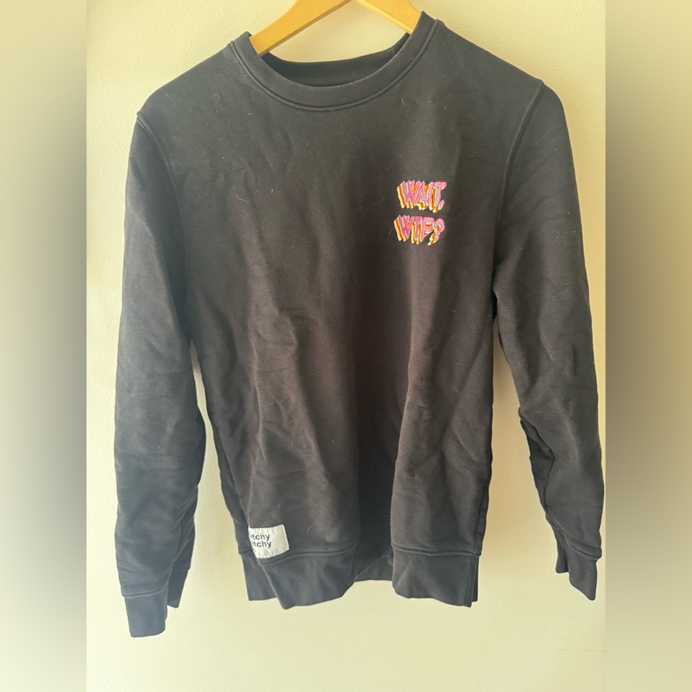 Trendy Black Crewneck Sweater with Graphic Design